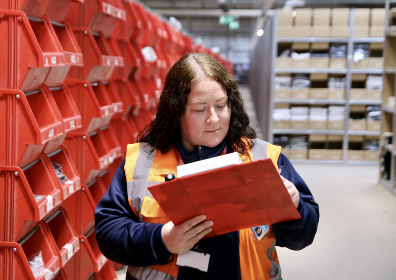 distribution centre security officer doing checks