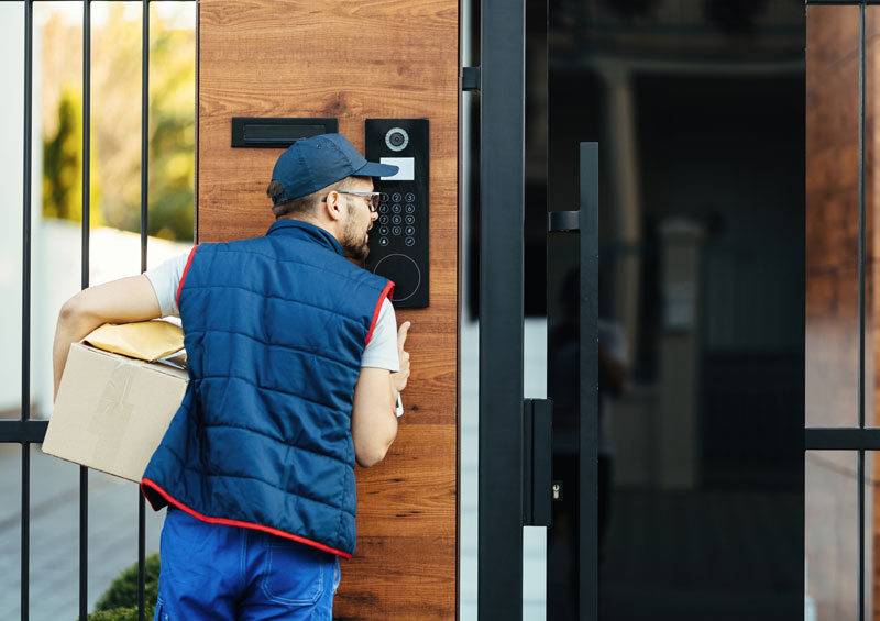 delivery staff using intercom for access to building