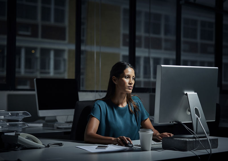 female lone worker in office