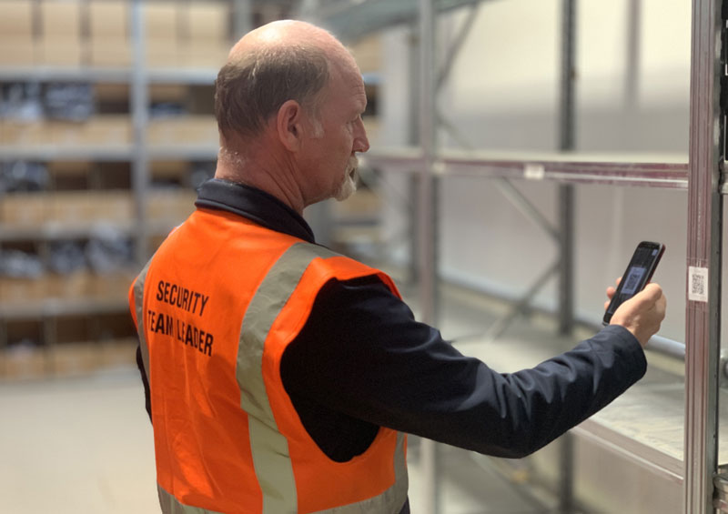 warehouse security officer patrolling