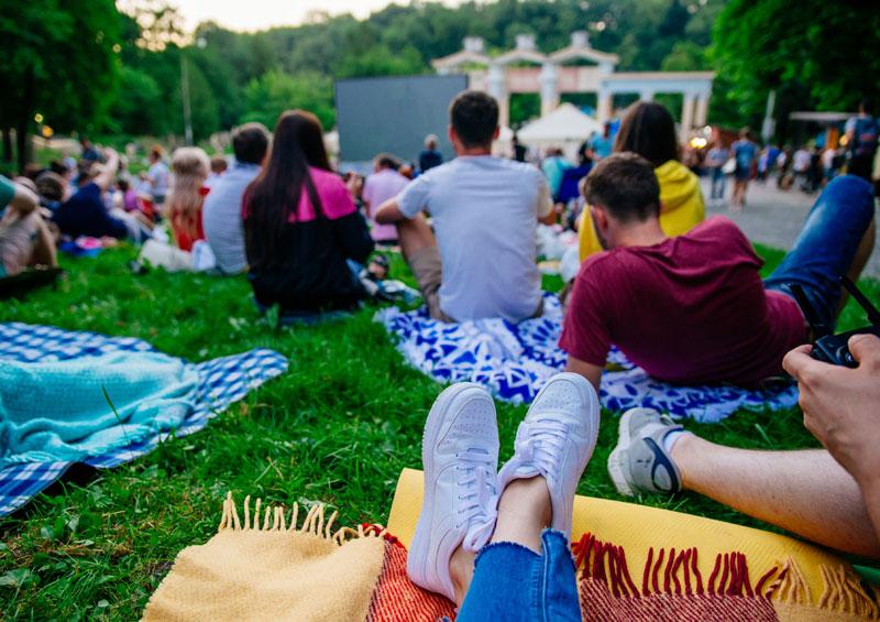 festival goers enjoying an outdoor summer concert, festivals require high quality security services